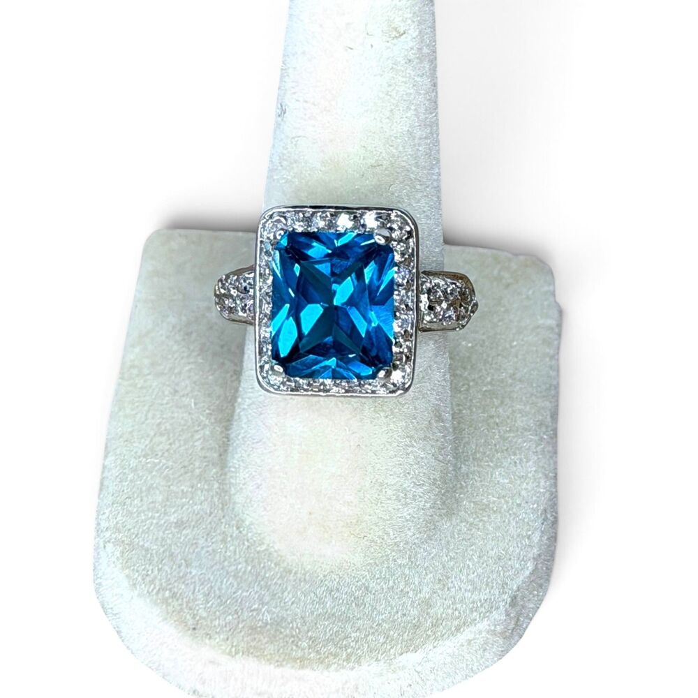 Emerald Cut Blue Gemstone Halo Ring UV Light Reactive